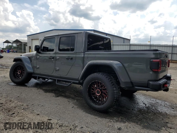 2021 Jeep Gladiator Rubicon с VIN 1C6JJTBG5ML507579, выставлен на аукционе Copart как лот 60409785 с пробегом 62 585 миль миль и Списание • Salvage title. История ставок и продаж доступна на DreamBid. Изображение 2.