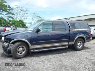 2001 Ford F-150 XLT z VIN 1FTRW07L21KC31753, wystawiony jako IAAI lot #42258913 z przebiegiem 205 960 mil mil oraz . Historia ofert i sprzedaży dostępna na DreamBid. Obrazek 14.