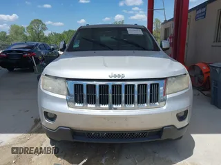 2011 Jeep Grand Cherokee Laredo with VIN 1J4RR4GG3BC540655, listed as a IAAI auction lot 42158522 with 214,341 mi miles and . Bid and sale history available at DreamBid. Image 6.