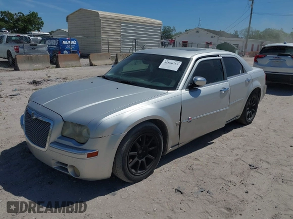 2007 Chrysler 300 C with VIN 2C3KA63H17H849672, listed as a IAAI auction lot 41800769 with 249,457 mi miles and . Bid and sale history available at carsss.com. Image 2.