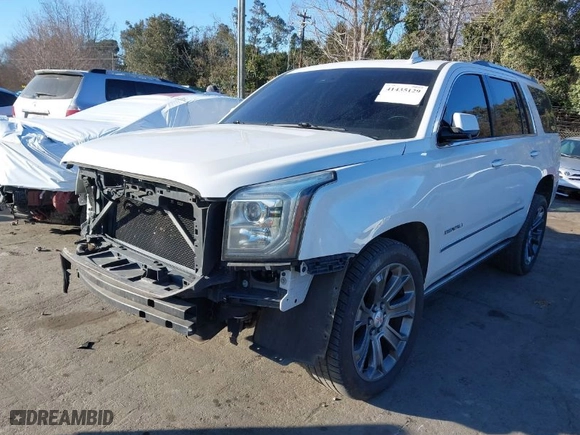 2016 GMC Yukon Denali with VIN 1GKS2CKJ1GR363542, listed as a IAAI auction lot 41435129 with 180,289 mi miles. Bid and sale history available at carsss.com. Image 2.