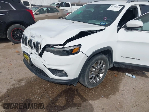 2019 Jeep Cherokee Latitude Plus with VIN 1C4PJLLB0KD307741, listed as a IAAI auction lot 41750370 with 76,036 mi miles. Bid and sale history available at carsss.com. Image 6.