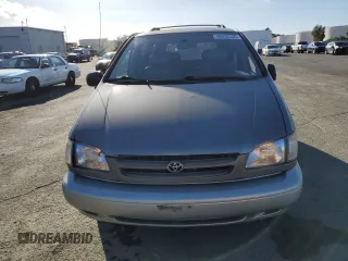 1999 Toyota Sienna LE with VIN 4T3ZF13C5XU144781, listed as a Copart auction lot 48932535 with 216,436 mi miles and Salvage Title. Bid and sale history available at carsss.com. Image 5.