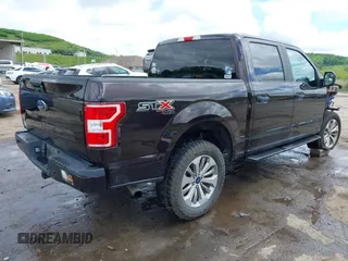2018 Ford F-150 XL with VIN 1FTEW1E55JFE21905, listed as a IAAI auction lot 42276693 with 77,260 mi miles and . Bid and sale history available at DreamBid. Image 4.