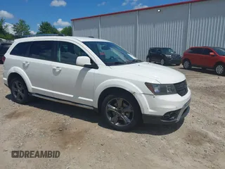 2015 Dodge Journey Crossroad with VIN 3C4PDCGB7FT723142, listed as a IAAI auction lot 42533562 with 217,413 mi miles and . Bid and sale history available at DreamBid. Image 1.