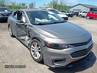 2018 Chevrolet Malibu LT z VIN 1G1ZD5STXJF225372, wystawiony jako IAAI lot #42161158 z przebiegiem Nie podano mil oraz . Historia ofert i sprzedaży dostępna na DreamBid. Obrazek 1.