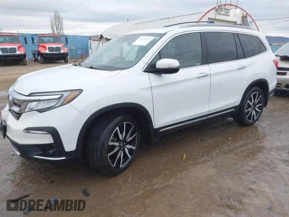2021 Honda Pilot Elite with VIN 5FNYF6H03MB044154, listed as a IAAI auction lot 41050202 with 60,331 mi miles and . Bid and sale history available at DreamBid. Image 19.