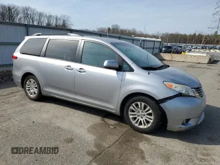 2012 Toyota Sienna XLE AAS with VIN 5TDYK3DCXCS235414, listed as a Copart auction lot 48776245 with 149,658 mi miles and Salvage Title. Bid and sale history available at carsss.com. Image 4.