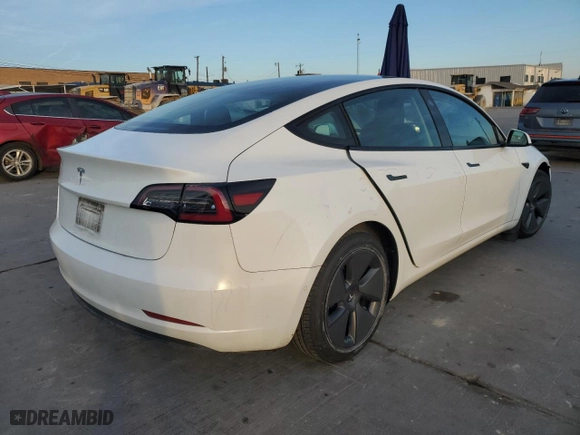 2021 Tesla Model 3 Standard Range Plus with VIN 5YJ3E1EAXMF097737, listed as a Copart auction lot 42717735 with 39,930 mi miles and Salvage Title. Bid and sale history available at carsss.com. Image 3.