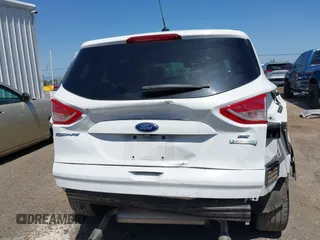 2015 Ford Escape SE with VIN 1FMCU0G91FUC65044, listed as a IAAI auction lot 42083688 with 111,972 mi miles and . Bid and sale history available at carsss.com. Image 17.