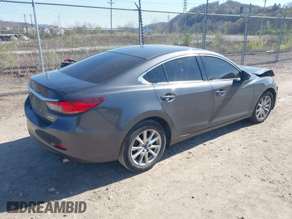 2016 Mazda 6 i Sport with VIN JM1GJ1U54G1413244, listed as a IAAI auction lot 42062416 with 148,970 mi miles and . Bid and sale history available at DreamBid. Image 4.