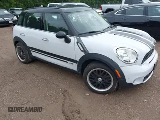 2014 MINI Countryman S z VIN WMWZC5C5XEWP37470, wystawiony jako IAAI lot #42396984 z przebiegiem 77 847 mil mil oraz . Historia ofert i sprzedaży dostępna na DreamBid. Obrazek 1.
