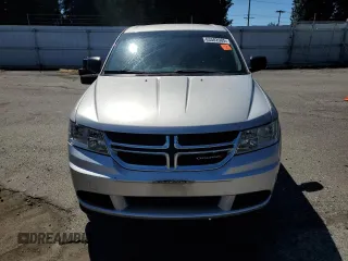 2013 Dodge Journey American Value with VIN 3C4PDCAB3DT650230, listed as a Copart auction lot 63502005 with 139,434 mi miles and Clean title. Bid and sale history available at DreamBid. Image 5.