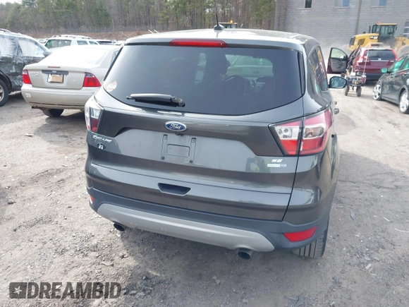 2017 Ford Escape SE with VIN 1FMCU9G90HUA32991, listed as a IAAI auction lot 41947411 with 118,654 mi miles. Bid and sale history available at carsss.com. Image 16.