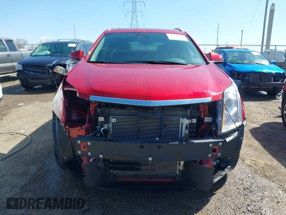 2014 Cadillac SRX Performance Collection with VIN 3GYFNCE34ES519563, listed as a IAAI auction lot 41967051 with 12,603 mi miles and . Bid and sale history available at carsss.com. Image 13.