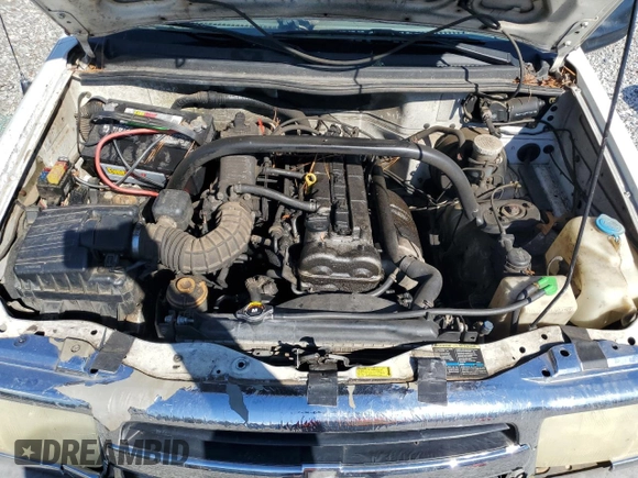 2003 Chevrolet Tracker z VIN 2CNBE13C736912038, wystawiony jako Copart lot #80422844 z przebiegiem 242 512 mil mil oraz Szkoda całkowita • Salvage title. Historia ofert i sprzedaży dostępna na DreamBid. Obrazek 12.