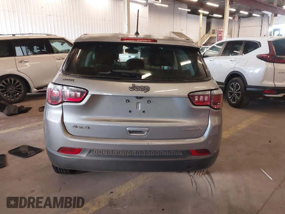 2018 Jeep Compass Sport z VIN 3C4NJDAB6JT179613, wystawiony jako IAAI lot #41893360 z przebiegiem 72 846 mil mil oraz . Historia ofert i sprzedaży dostępna na DreamBid. Obrazek 16.