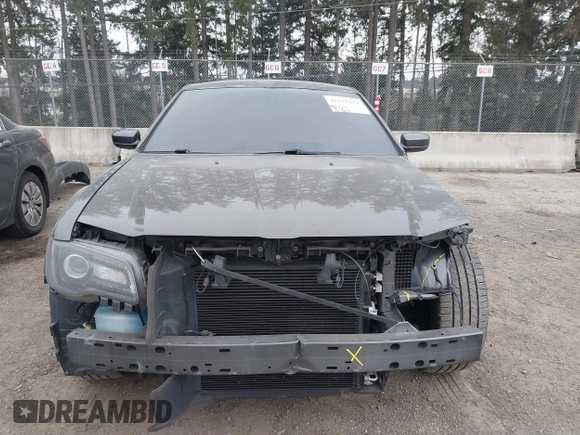 2019 Chrysler 300 S with VIN 2C3CCABG8KH601034, listed as a IAAI auction lot 41571454 with 104,632 mi miles and . Bid and sale history available at DreamBid. Image 13.