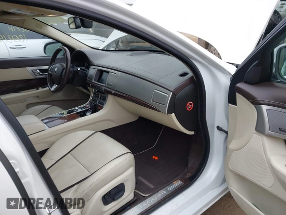 2015 Jaguar XF V6 Portfolio with VIN SAJWJ0FF2F8U59934, listed as a IAAI auction lot 41558305 with 120,219 mi miles. Bid and sale history available at carsss.com. Image 5.