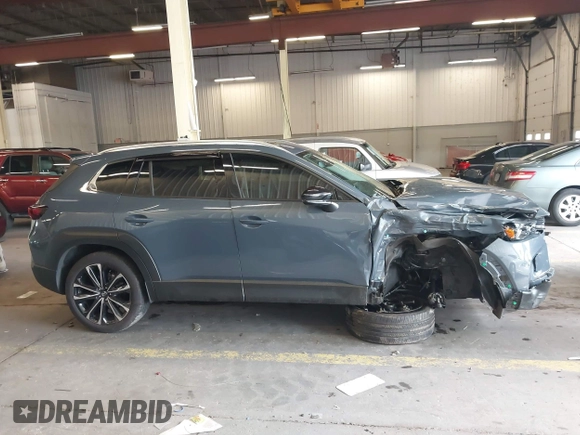 2024 Mazda CX-50 S Premium Plus z VIN 7MMVABEM7RN194987, wystawiony jako IAAI lot #42267229 z przebiegiem 10 039 mil mil oraz . Historia ofert i sprzedaży dostępna na DreamBid. Obrazek 13.