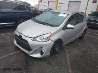 2015 Toyota Prius c One with VIN JTDKDTB39F1101482, listed as a IAAI auction lot 41177534 with 135,502 mi miles. Bid and sale history available at carsss.com. Image 2.