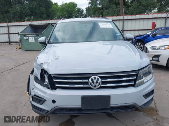 2018 Volkswagen Tiguan S with VIN 3VV1B7AX0JM092116, listed as a IAAI auction lot 42388339 with 103,412 mi miles and . Bid and sale history available at DreamBid. Image 18.