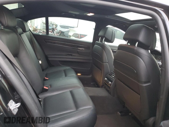 2014 BMW 7 Series 740Li xDrive with VIN WBAYF4C59ED281776, listed as a Copart auction lot 83563234 with 77,899 mi miles and Salvage Title. Bid and sale history available at carsss.com. Image 10.