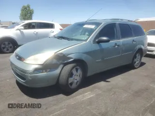 2004 Ford Focus SE with VIN 1FAFP36384W191801, listed as a Copart auction lot 63661465 with 144,226 mi miles and Salvage title. Bid and sale history available at DreamBid. Image 1.