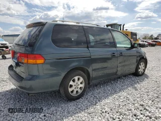 2003 Honda Odyssey EX-L z VIN 5FNRL18943B020961, wystawiony jako Copart lot #86009874 z przebiegiem 155 993 mil mil oraz Szkoda całkowita • Salvage title. Historia ofert i sprzedaży dostępna na DreamBid. Obrazek 3.