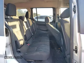 2014 Ford Transit Connect XLT с VIN NM0AE8F7XE1149510, выставлен на аукционе Copart как лот 82015004 с пробегом 75 499 миль миль и Списание • Salvage title. История ставок и продаж доступна на DreamBid. Изображение 11.
