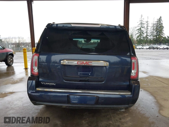 2018 GMC Yukon Denali with VIN 1GKS2CKJ4JR349089, listed as a IAAI auction lot 41862503 with 117,134 mi miles. Bid and sale history available at carsss.com. Image 16.