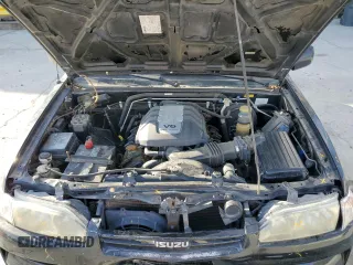 2002 Isuzu Axiom with VIN 4S2CE58XX24612512, listed as a Copart auction lot 77952574 with 201,436 mi miles and Salvage Title. Bid and sale history available at carsss.com. Image 12.