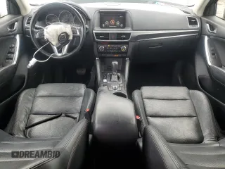 2016 Mazda CX-5 Grand Touring with VIN JM3KE2DYXG0839774, listed as a Copart auction lot 52336275 with 125,605 mi miles and Salvage Title. Bid and sale history available at carsss.com. Image 8.
