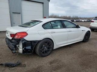 2015 BMW 6 Series 640i xDrive z VIN WBA6B8C56FD453175, wystawiony jako Copart lot #81372044 z przebiegiem 111 835 mil mil oraz Czysty tytuł • Clean title. Historia ofert i sprzedaży dostępna na DreamBid. Obrazek 3.