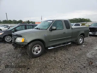 2002 Ford F-150 XL with VIN 1FTRX17L82NB58651, listed as a Copart auction lot 65712545 with Not provided miles and Salvage title. Bid and sale history available at DreamBid. Image 1.
