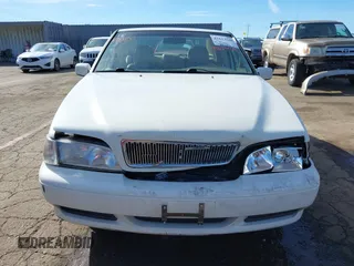 1999 Volvo S70 z VIN YV1LS55A8X1580392, wystawiony jako IAAI lot #41623528 z przebiegiem 77 806 mil mil oraz . Historia ofert i sprzedaży dostępna na DreamBid. Obrazek 12.