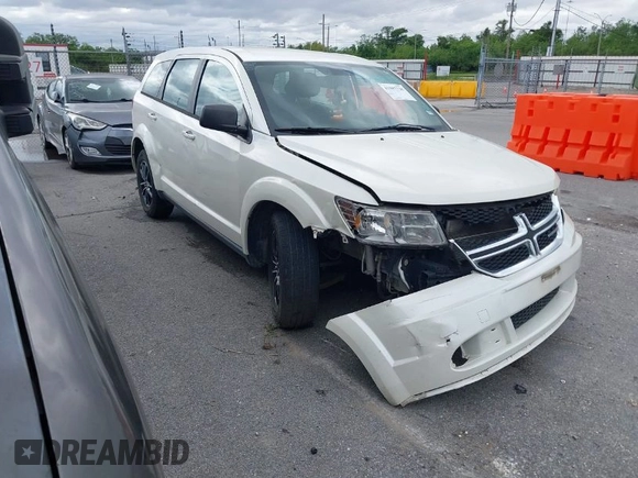 2014 Dodge Journey SE with VIN 3C4PDCAB1ET192530, listed as a IAAI auction lot 41987728 with 186,486 mi miles and . Bid and sale history available at carsss.com. Image 1.