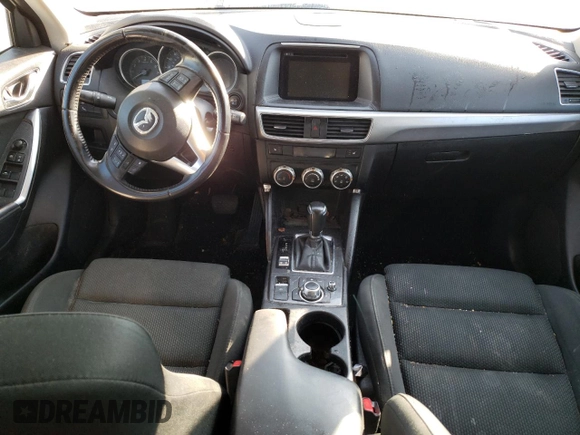 2016 Mazda CX-5 Touring with VIN JM3KE2CY6G0896040, listed as a Copart auction lot 78399684 with 98,639 mi miles and Salvage Title. Bid and sale history available at DreamBid. Image 8.