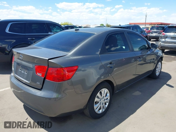 2013 Kia Forte EX with VIN KNAFU4A27D5724120, listed as a IAAI auction lot 42153084 with 154,860 mi miles. Bid and sale history available at carsss.com. Image 4.