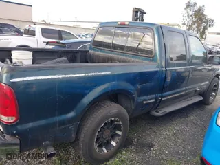 1999 Ford Super Duty F-250 XL with VIN 1FTNW20L2XEC39945, listed as a IAAI auction lot 41341682 with 368,263 mi miles. Bid and sale history available at carsss.com. Image 4.