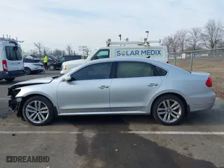 2016 Volkswagen Passat 1.8T SEL with VIN 1VWCT7A3XGC018484, listed as a IAAI auction lot 41763388 with 123,484 mi miles. Bid and sale history available at carsss.com. Image 14.