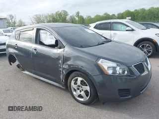 2009 Pontiac Vibe 1SA with VIN 5Y2SP67899Z449012, listed as a IAAI auction lot 42243359 with 144,456 mi miles and . Bid and sale history available at DreamBid. Image 1.