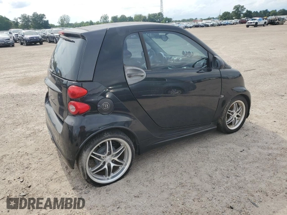 2009 Smart fortwo Pure z VIN WMEEJ31XX9K269982, wystawiony jako Copart lot #59214215 z przebiegiem 99 711 mil mil oraz Tytuł czysty. Historia ofert i sprzedaży dostępna na DreamBid. Obrazek 3.
