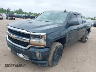 2018 Chevrolet Silverado 1500 LT with VIN 1GCRCREC9JZ105218, listed as a IAAI auction lot 40778682 with 124,621 mi miles and . Bid and sale history available at DreamBid. Image 17.