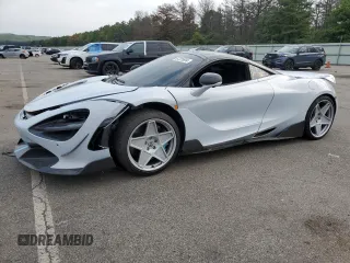 2019 McLaren 720S with VIN SBM14DCAXKW003449, listed as a Copart auction lot 67229694 with 56,091 mi miles and Salvage Title. Bid and sale history available at DreamBid. Image 1.