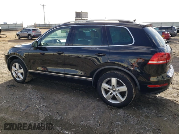 2012 Volkswagen Touareg Lux z VIN WVGEK9BP4CD008562, wystawiony jako Copart lot #47947675 z przebiegiem 136 048 mil mil oraz Szkoda całkowita • Salvage title. Historia ofert i sprzedaży dostępna na DreamBid. Obrazek 2.