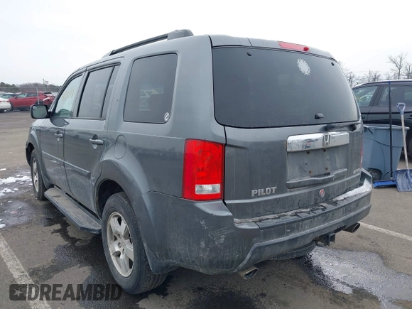 2011 Honda Pilot EX-L with VIN 5FNYF4H65BB009279, listed as a IAAI auction lot 41554301 with 226,337 mi miles and . Bid and sale history available at carsss.com. Image 3.
