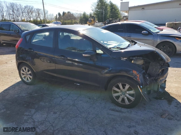 2013 Ford Fiesta SE with VIN 3FADP4EJXDM202150, listed as a Copart auction lot 79851174 with 127,979 mi miles and Salvage Title. Bid and sale history available at carsss.com. Image 4.