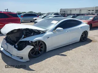 2020 Tesla Model S Performance with VIN 5YJSA1E49LF360655, listed as a IAAI auction lot 42777670 with Not provided miles and . Bid and sale history available at DreamBid. Image 2.