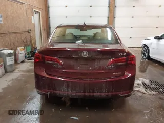 2015 Acura TLX Advance z VIN 19UUB3F70FA010680, wystawiony jako IAAI lot #41609571 z przebiegiem 123 004 mil mil oraz . Historia ofert i sprzedaży dostępna na DreamBid. Obrazek 16.